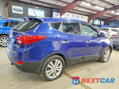 Trzecie zdjęcie samochodu z tyłu: 2012 HYUNDAI TUCSON LIMITED VIN:KM8JUCAC5CU436936 - miniatura