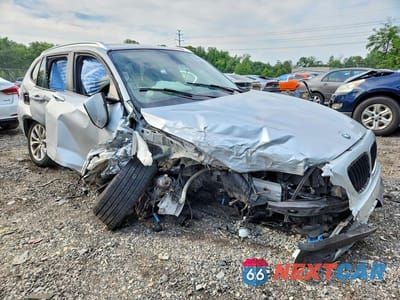 Czwarte zdjęcie samochodu z boku: 2014 BMW X1 XDRIVE28I VIN:WBAVL1C54EVY15125 - miniatura