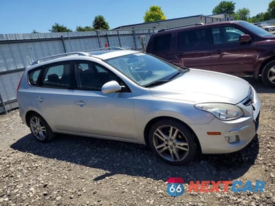 Czwarte zdjęcie samochodu z boku: 2012 HYUNDAI ELANTRA TOURING SE VIN:KMHDC8AE6CU136904 - miniatura