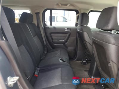 Zdjęcie 10 z 12 samochodu: 2009 HUMMER H3 VIN:5GTEN13E498135333 - miniatura