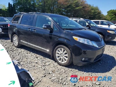 Czwarte zdjęcie samochodu z boku: 2014 TOYOTA SIENNA LIMITED 7-PASSENGER VIN:5TDDK3DC8ES087829 - miniatura