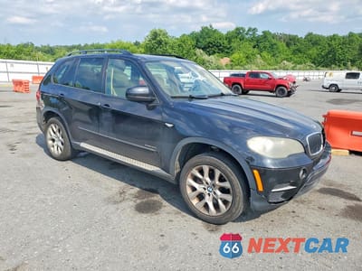 Czwarte zdjęcie samochodu z boku: 2011 BMW X5 XDRIVE35I VIN:5UXZV4C50BL408702 - miniatura