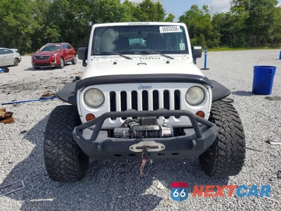 Piąte zdjęcie samochodu w środku: 2011 JEEP WRANGLER SPORT VIN:1J4AA2D10BL568065 - miniatura