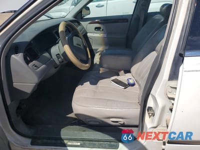 Zdjęcie 7 z 12 samochodu: 1998 LINCOLN TOWN CAR EXECUTIVE VIN:1LNFM81W5WY663487 - miniatura