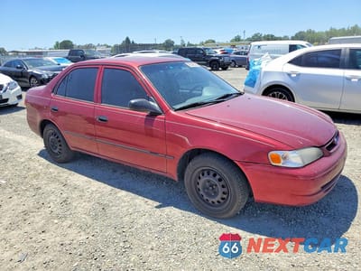 Czwarte zdjęcie samochodu z boku: 2000 TOYOTA COROLLA VE VIN:1NXBR12E3YZ350557 - miniatura