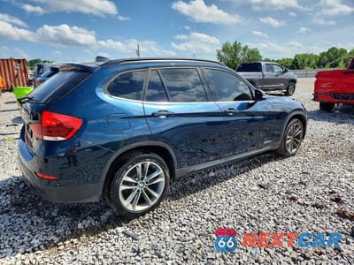 Trzecie zdjęcie samochodu z tyłu: 2013 BMW X1 SDRIVE28I VIN:WBAVM1C50DVW46474 - miniatura