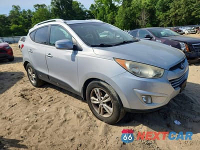 Czwarte zdjęcie samochodu z boku: 2013 HYUNDAI TUCSON GLS VIN:KM8JUCAC7DU621667 - miniatura