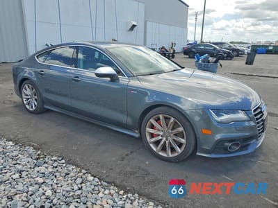 Czwarte zdjęcie samochodu z boku: 2013 AUDI A7 PRESTIGE VIN:WAU2GAFC1DN107236 - miniatura