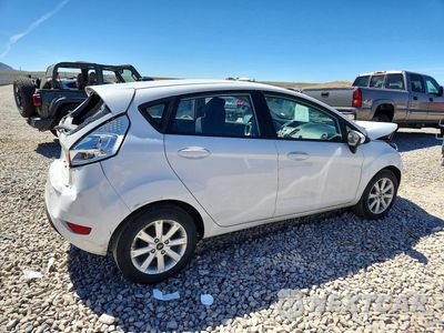 Trzecie zdjęcie samochodu z tyłu: 2012 FORD FIESTA SE VIN:3FADP4EJ5CM101614 - miniatura