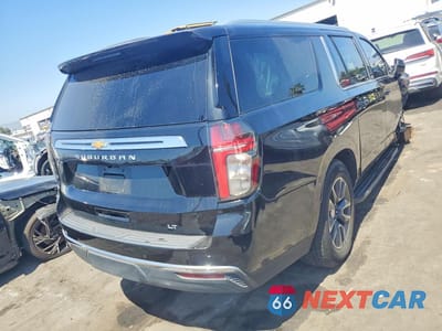 Trzecie zdjęcie samochodu z tyłu: 2021 CHEVROLET SUBURBAN C1500 LT VIN:1GNSCCKD8MR360272 - miniatura