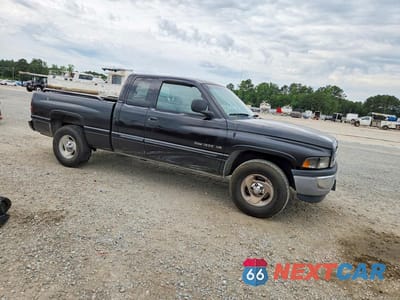 Czwarte zdjęcie samochodu z boku: 2001 DODGE RAM 1500 VIN:3B7HC13YX1G801999 - miniatura