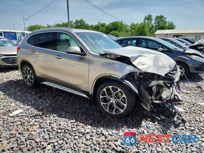 Czwarte zdjęcie samochodu z boku: 2021 BMW X1 SDRIVE28I VIN:WBXJG7C08M5U37633 - miniatura