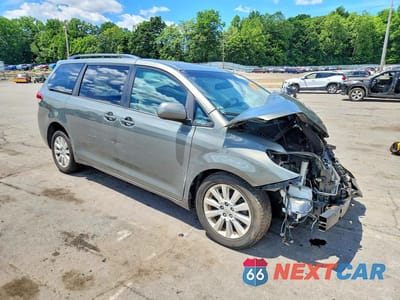 Czwarte zdjęcie samochodu z boku: 2011 TOYOTA SIENNA XLE 7-PASSENGER VIN:5TDDK3DC1BS011719 - miniatura