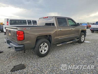Trzecie zdjęcie samochodu z tyłu: 2014 CHEVROLET SILVERADO K1500 LTZ VIN:3GCUKSEC4EG374043 - miniatura