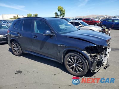 Czwarte zdjęcie samochodu z boku: 2022 BMW X5 XDRIVE45E VIN:5UXTA6C09N9K28539 - miniatura
