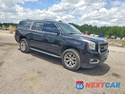 Czwarte zdjęcie samochodu z boku: 2019 GMC YUKON XL C1500 SLT VIN:1GKS1JKC6KR324298 - miniatura