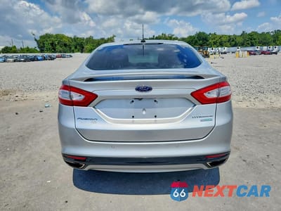 Zdjęcie 6 z 12 samochodu: 2016 FORD FUSION TITANIUM VIN:3FA6P0K9XGR211630 - miniatura