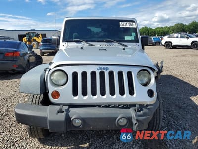 Piąte zdjęcie samochodu w środku: 2011 JEEP WRANGLER SPORT VIN:1J4AA2D11BL609089 - miniatura