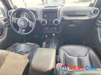 Zdjęcie 8 z 14 samochodu: 2014 JEEP WRANGLER UNLIMITED SAHARA VIN:1C4BJWEG9EL305419 - miniatura