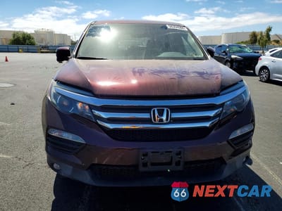 Piąte zdjęcie samochodu w środku: 2017 HONDA PILOT EXLN VIN:5FNYF5H73HB013368 - miniatura