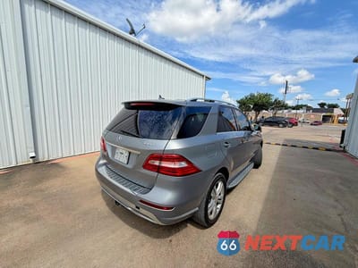Czwarte zdjęcie samochodu z boku: 2013 MERCEDES-BENZ ML 350 4MATIC VIN:4JGDA5HB9DA245358 - miniatura