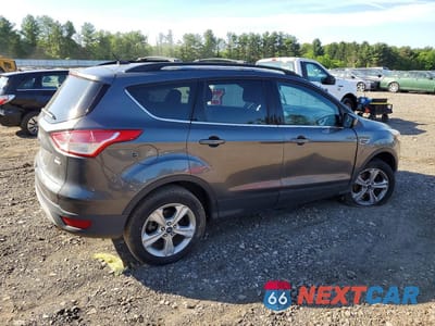 Trzecie zdjęcie samochodu z tyłu: 2016 FORD ESCAPE SE VIN:1FMCU9G96GUA01811 - miniatura