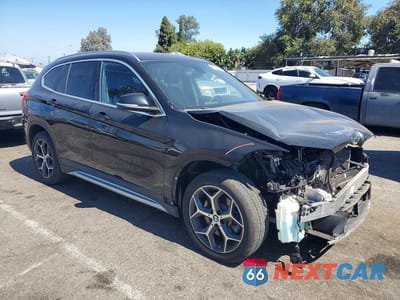 Czwarte zdjęcie samochodu z boku: 2018 BMW X1 SDRIVE28I VIN:WBXHU7C38J3H42447 - miniatura