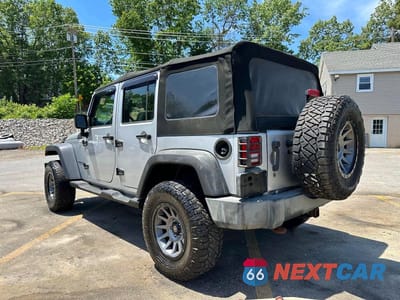 Drugie zdjęcie samochodu z przodu: 2010 JEEP WRANGLER UNLIMITED SPORT VIN:1J4BA3H10AL100100 - miniatura