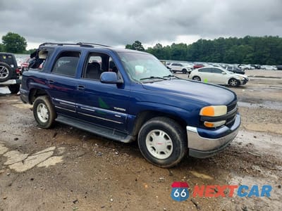 Czwarte zdjęcie samochodu z boku: 2002 GMC YUKON VIN:1GKEC13Z92R196410 - miniatura
