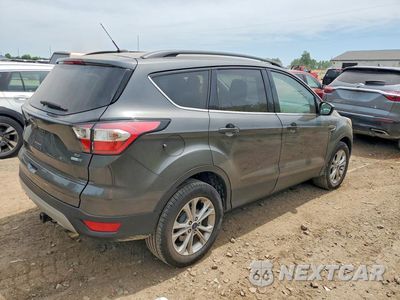 Trzecie zdjęcie samochodu z tyłu: 2018 FORD ESCAPE SE VIN:1FMCU9GD5JUA37873 - miniatura