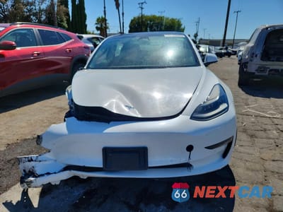 Piąte zdjęcie samochodu w środku: 2022 TESLA MODEL 3 VIN:5YJ3E1EA8NF290101 - miniatura