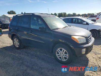 Czwarte zdjęcie samochodu z boku: 2002 TOYOTA RAV4 BASE VIN:JTEGH20V026000803 - miniatura
