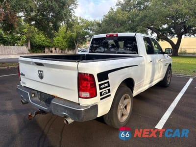 Czwarte zdjęcie samochodu z boku: 2014 RAM 1500 SLT VIN:1C6RR6GT8ES480498 - miniatura