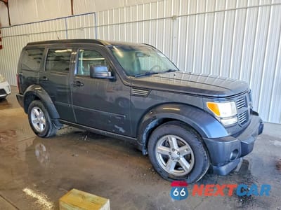 Czwarte zdjęcie samochodu z boku: 2011 DODGE NITRO SXT VIN:1D4PU5GKXBW549330 - miniatura