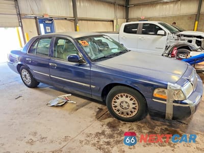 Czwarte zdjęcie samochodu z boku: 2004 MERCURY GRAND MARQUIS GS VIN:2MEFM74W04X605101 - miniatura