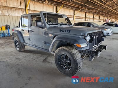 Czwarte zdjęcie samochodu z boku: 2023 JEEP WRANGLER 4XE VIN:1C4JJXN6XPW661324 - miniatura