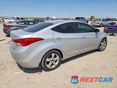 Trzecie zdjęcie samochodu z tyłu: 2013 HYUNDAI ELANTRA GLS VIN:KMHDH4AE8DU577462 - miniatura