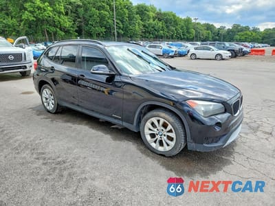 Czwarte zdjęcie samochodu z boku: 2014 BMW X1 XDRIVE28I VIN:WBAVL1C5XEVY23553 - miniatura