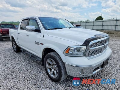 Czwarte zdjęcie samochodu z boku: 2018 RAM 1500 LARAMIE VIN:1C6RR7NM9JS249038 - miniatura