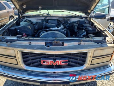 Zdjęcie 12 z 13 samochodu: 1999 GMC YUKON VIN:1GKEK13R0XJ734825 - miniatura