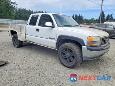 Czwarte zdjęcie samochodu z boku: 1999 GMC NEW SIERRA K2500 VIN:1GTGK29U5XZ524664 - miniatura