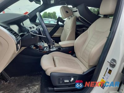 Zdjęcie 7 z 13 samochodu: 2021 BMW X3 XDRIVE30E VIN:5UXTS1C02M9H02476 - miniatura