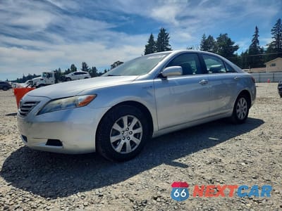 2009 TOYOTA CAMRY HYBRID BASE JTNBB46K393049803 - główne zdjęcie licytacji z USA - miniatura