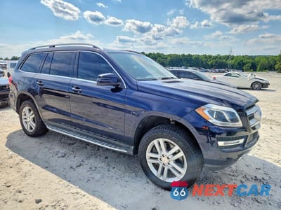 Czwarte zdjęcie samochodu z boku: 2013 MERCEDES-BENZ GL 450 4MATIC VIN:4JGDF7CE5DA169359 - miniatura
