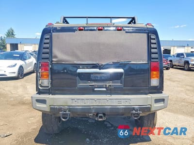 Zdjęcie 6 z 13 samochodu: 2004 HUMMER H2 VIN:5GRGN23UX4H103393 - miniatura