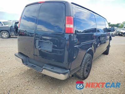 Trzecie zdjęcie samochodu z tyłu: 2014 CHEVROLET EXPRESS G1500 VIN:1GCSHAF49E1200880 - miniatura