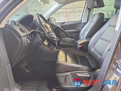 Zdjęcie 7 z 13 samochodu: 2014 VOLKSWAGEN TIGUAN S VIN:WVGAV3AX4EW616514 - miniatura