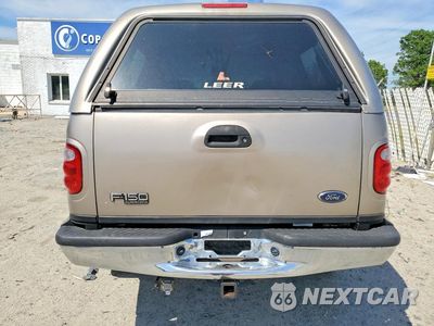 Zdjęcie 6 z 12 samochodu: 2001 FORD F150 SUPERCREW VIN:1FTRW08L81KA41972 - miniatura