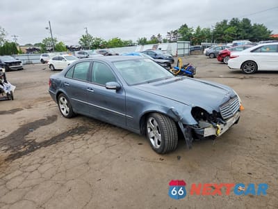Czwarte zdjęcie samochodu z boku: 2006 MERCEDES-BENZ E 500 4MATIC VIN:WDBUF83J66X200432 - miniatura