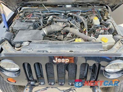 Zdjęcie 12 z 13 samochodu: 2010 JEEP WRANGLER SPORT VIN:1J4AA2D14AL216900 - miniatura